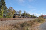 NS 1137 and 4084 head west with 100 empty coal hoppers